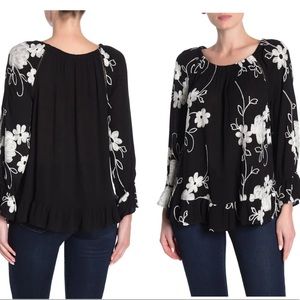 Off-the-Shoulder Floral Print Blouse
LIV Los Angeles